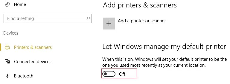 Tắt nút chuyển trong "Let Windows manage my default printer."